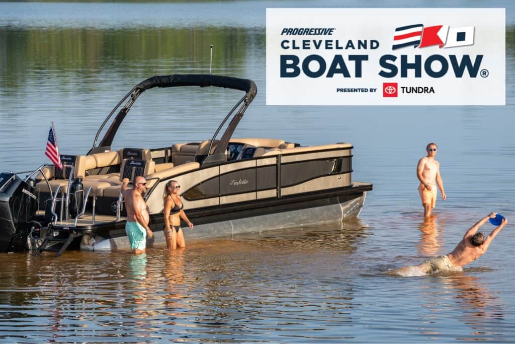 A family is enjoying a day out on the lake with their Barletta Pontoon